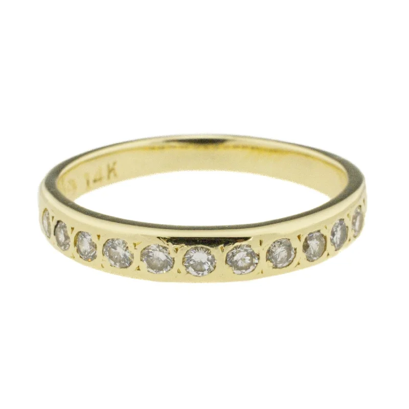 engagement rings with vintage designs -0.22ctw Diamond Accented Wedding Band in 14K Yellow Gold - Size 6.25